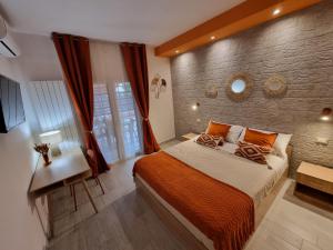 a bedroom with a large bed and a window at Eden Bay Vacation Home in Ladispoli +17 photos