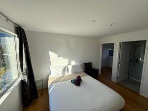 Postel nebo postele na pokoji v ubytování Qt inntouch