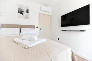 Postel nebo postele na pokoji v ubytování Villa Nino + 32 fotografií