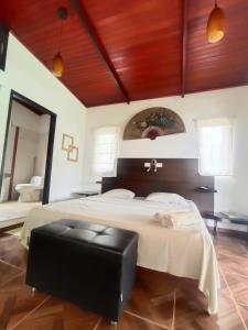 Postel nebo postele na pokoji v ubytování Mauka Oasis Taganga