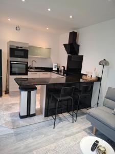 Η κουζίνα ή μικρή κουζίνα στο Appartement cosy proche centre-ville