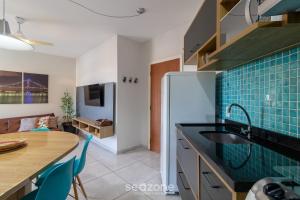 Köök või kööginurk majutusasutuses Aptos em Condo com Piscina em Floripa - GVM