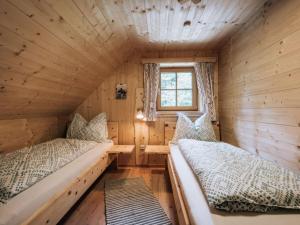 Posteľ alebo postele v izbe v ubytovaní Webertonihütte Modern retreat