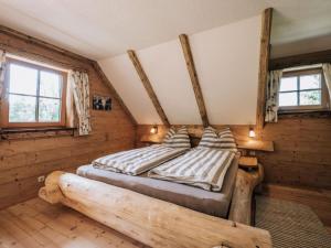 Posteľ alebo postele v izbe v ubytovaní Webertonihütte Modern retreat