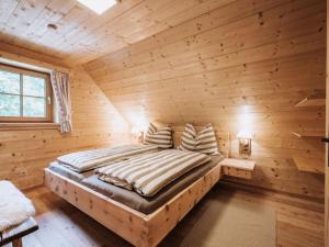 Posteľ alebo postele v izbe v ubytovaní Webertonihütte Modern retreat