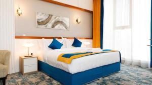 Ένα ή περισσότερα κρεβάτια σε δωμάτιο στο Dancenter Hotel Near Jeddah Airport