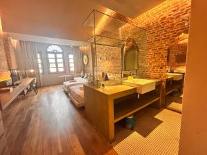 Phòng tắm tại Loke Thye Kee Artiste Boutique Hotel +50 ảnh