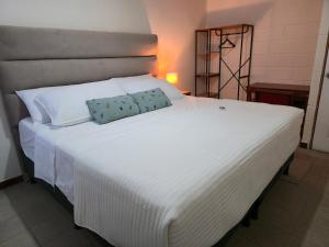 Ένα ή περισσότερα κρεβάτια σε δωμάτιο στο New House in Ciudad Merliot