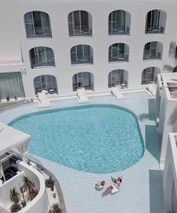 Πισίνα στο ή κοντά στο Roy Hotel-Yalong Bay Bohou Village