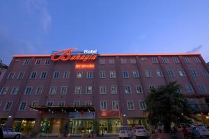 a large building with a sign on top of it at Bahagia Hotel Langkawi in Kuah