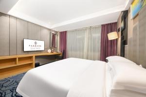 深圳中天美景大酒店(宝安国际机场西乡地铁站店)客房内的一张或多张床位