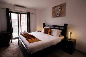 Ένα ή περισσότερα κρεβάτια σε δωμάτιο στο Elegant & Luxury Gem-5 Star Location -Pools Gym! +38 φωτογραφίες