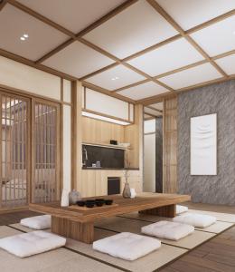 TimuranにあるAmani Suites Yogyakartaのテレビ付きリビングルームの表示