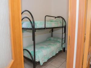 Postel nebo postele na pokoji v ubytování Apartment in Vieste, a drive away from the sea