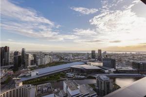an aerial view of a city with tall buildings at 35D Amazing Abnb-Style City View Yarra River Free Parking 2BR in Melbourne +39 photos