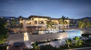 a building with a swimming pool and a resort at Landing Apartments near UT San Antonio in San Antonio