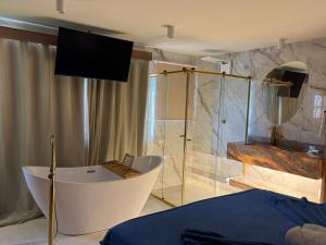 Vannituba majutusasutuses Edifício Creta Hotel