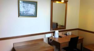 Ein Sitzbereich in der Unterkunft Four Chain View Hotel