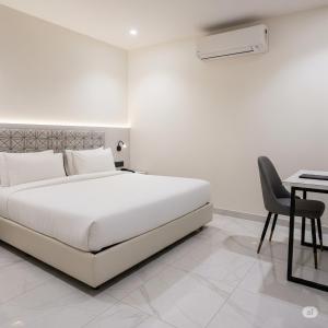 Postel nebo postele na pokoji v ubytování Orchha Stay Inn