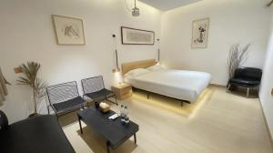 Ένα ή περισσότερα κρεβάτια σε δωμάτιο στο Fenghuang Persimmon Courtyard B&B