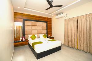 Postel nebo postele na pokoji v ubytování Greencoconutresort