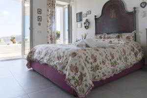 Ένα ή περισσότερα κρεβάτια σε δωμάτιο στο Tenuta Mongiardino