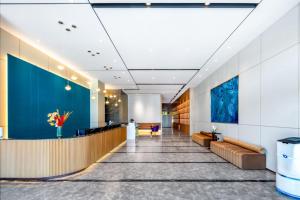 El lobby o recepción de 忻州古城万信至格酒店