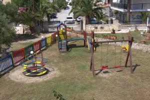 a park with a playground with a slide at Hanioti Grand Victoria in Hanioti