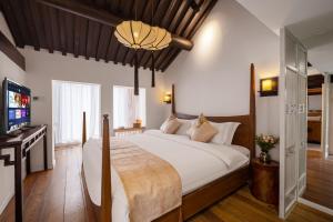 Beijing Le Zai Nan Luo Gu Xiang Wang Fu Jing Forbidden City Courtyard Hotel&Free laundry service&Free coffee &Paid Dumpling experience service客房内的一张或多张床位