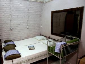 Postel nebo postele na pokoji v ubytování 10-Z Bunker