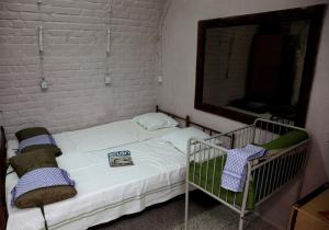 Postel nebo postele na pokoji v ubytování 10-Z Bunker