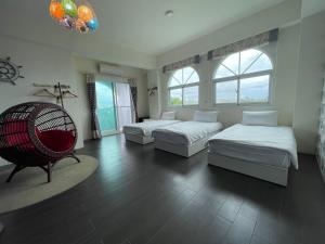Lova arba lovos apgyvendinimo įstaigoje Ding Shian B&B