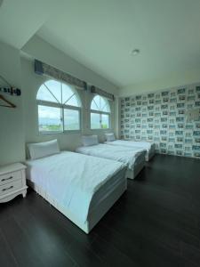 Lova arba lovos apgyvendinimo įstaigoje Ding Shian B&B