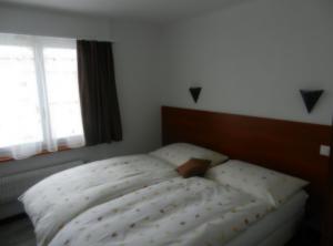 Katil atau katil-katil dalam bilik di Hôtel Terminus