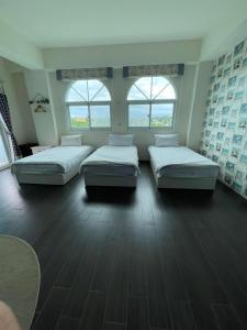 Lova arba lovos apgyvendinimo įstaigoje Ding Shian B&B