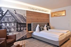 Postel nebo postele na pokoji v ubytování Hotel Hirschen