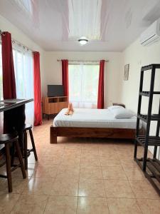 En eller flere senge i et værelse på Estancia Rincón Verde