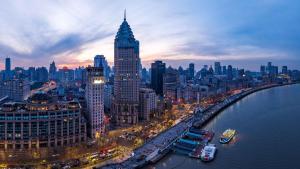 an aerial view of a city with a tall building at Maxx by Steigenberger on the Bund Shanghai in Shanghai