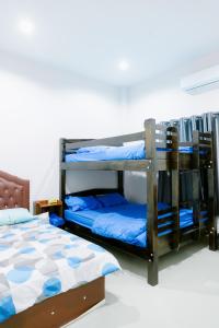 Voodi või voodid majutusasutuse Natacha Pool Villa 3 toas