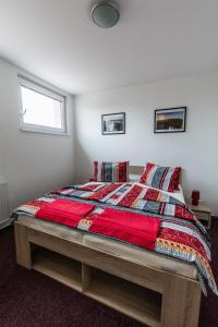 Posteľ alebo postele v izbe v ubytovaní Apartmány Vilma