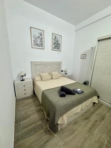 Postel nebo postele na pokoji v ubytování Apartamento Martina 1
