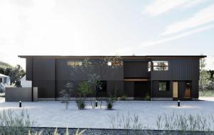 a black house with a courtyard at Hakuba Amber Resort by Jade Group in Hakuba