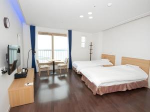 TV a/nebo společenská místnost v ubytování Oneness Resort