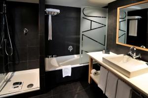 Ein Badezimmer in der Unterkunft Hotel Jazz