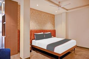 Postel nebo postele na pokoji v ubytování Hotel O Vrindavan + 28 fotografií