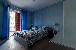 A bed or beds in a room at Guest House Roma Express