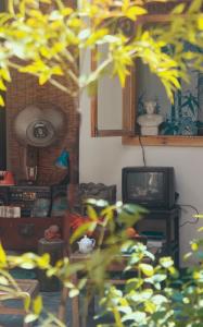 TV a/nebo společenská místnost v ubytování Phoenix Persimmon Courtyard