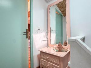 a bathroom with a sink and a mirror at La Maison Ocre in Mirepeisset +61 photos