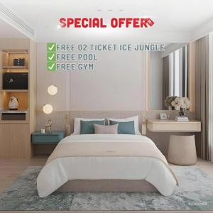a bedroom with a large bed in a room at Mey Mansion Hotel Phu Quoc in Phu Quoc