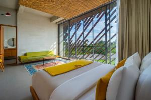 Posezení v ubytování Atap Resort Canggu by Ini Vie Hospitality